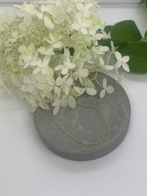 Tiny gold bead choker