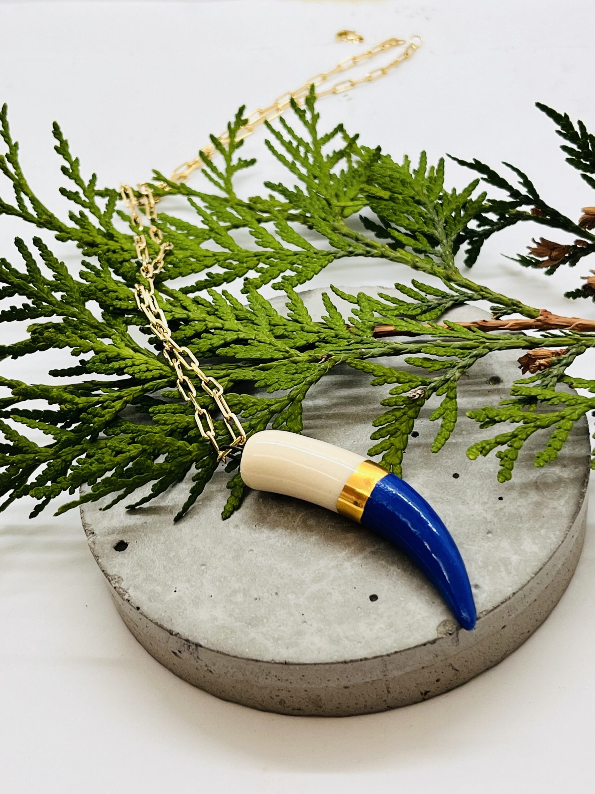 Carola Spitzer
Porcelain “Shark Tooth” Necklace -Dark Blue